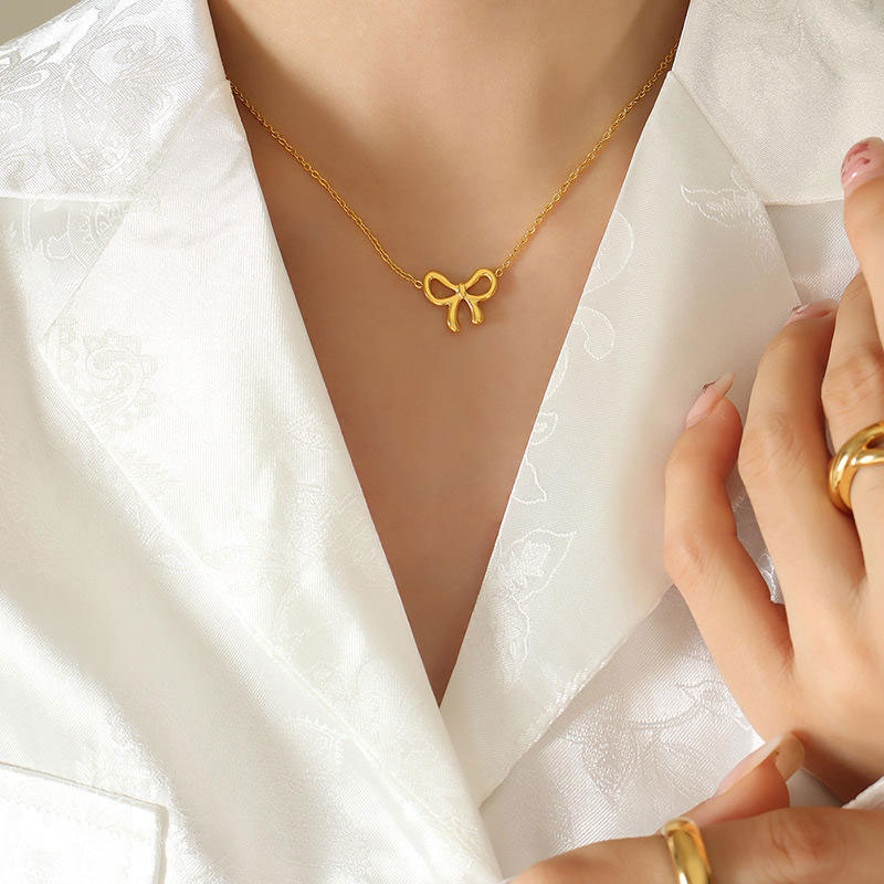 Minimalist Design Stainless Steel Necklace with Romantic 18K Gold Plating Waterproof Tempered Knot Bow Pendant Accessory